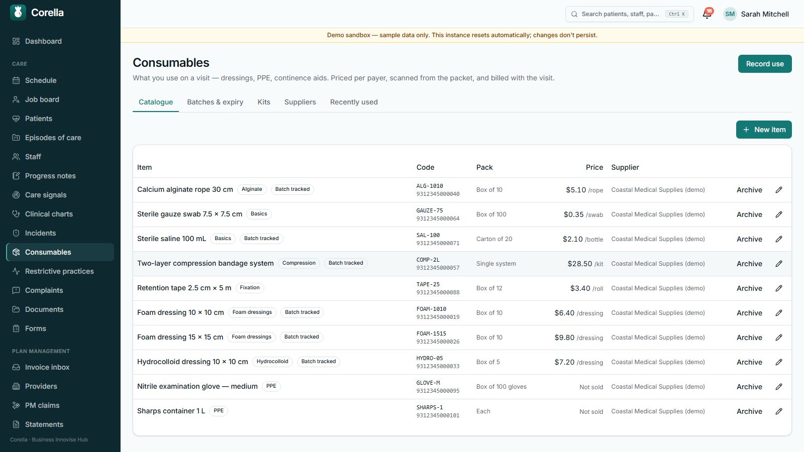 A community nursing consumables catalogue in Corella: alginate rope, gauze, saline, compression bandage, foam and hydrocolloid dressings with pack sizes, prices, batch-tracked flags and supplier